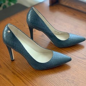 Size 11 Calvin Klein blue leather 4 inch heel. NWT